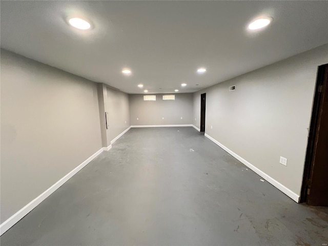 below grade area with recessed lighting and baseboards