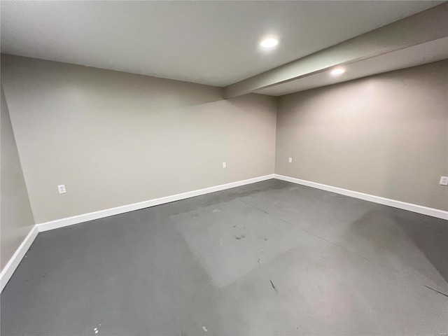 finished below grade area with recessed lighting and baseboards