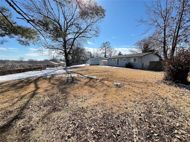 view of yard with fence