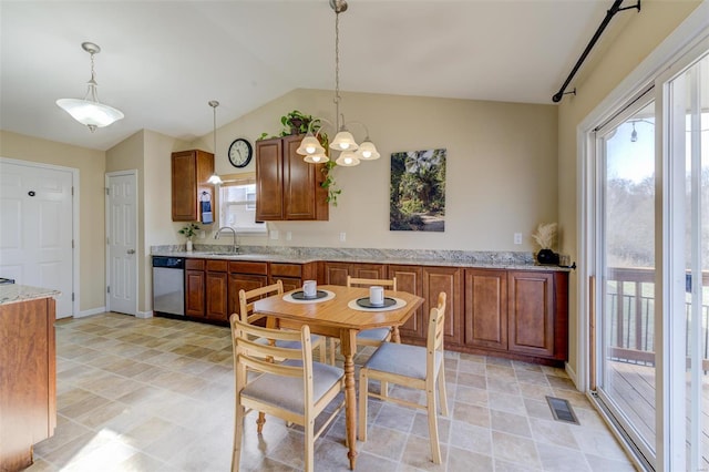 kitchen with a sink, visible vents, dishwasher, and brown cabinetry