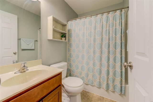 bathroom with tile patterned flooring, toilet, and vanity