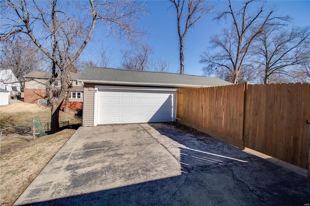 garage with fence