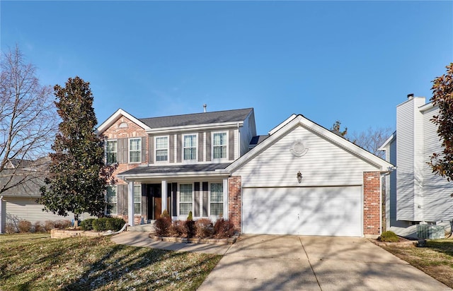 view of front of property with concrete driveway, brick siding, and an attached garage