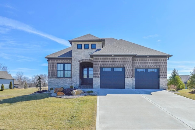 view of front of house featuring a garage, concrete driveway, stone siding, roof with shingles, and a front yard