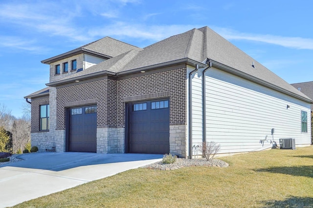 view of side of property with driveway, a shingled roof, cooling unit, and a yard