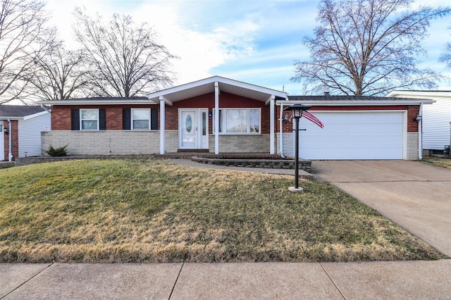 single story home featuring a garage, brick siding, driveway, and a front lawn