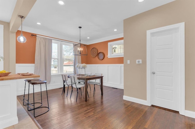 dining room with baseboards, recessed lighting, dark wood-style flooring, and wainscoting