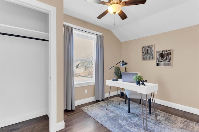 office featuring a ceiling fan, lofted ceiling, wood finished floors, and baseboards