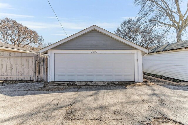 garage with fence