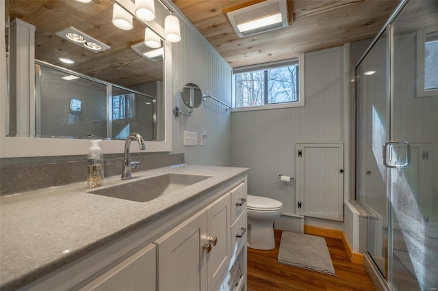 full bathroom with wooden ceiling, a shower stall, wood finished floors, and vanity