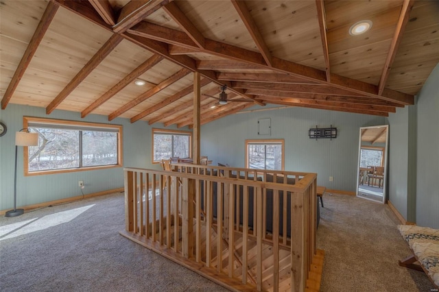 bonus room featuring vaulted ceiling with beams, wooden ceiling, and carpet flooring