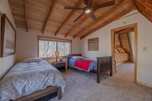 bedroom with vaulted ceiling with beams, carpet floors, and wooden ceiling