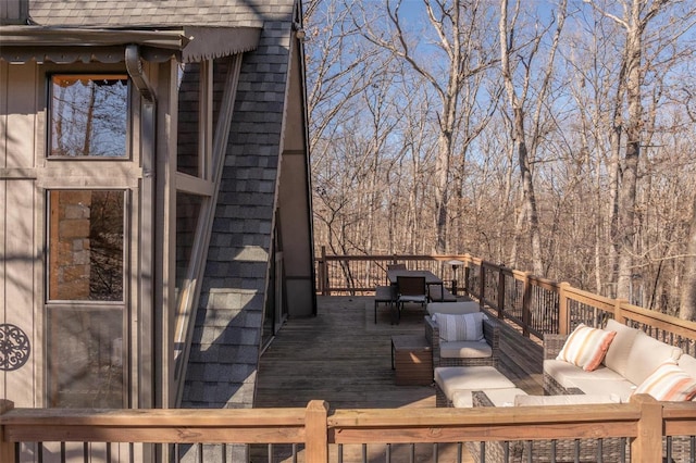 wooden deck featuring outdoor dining area and outdoor lounge area