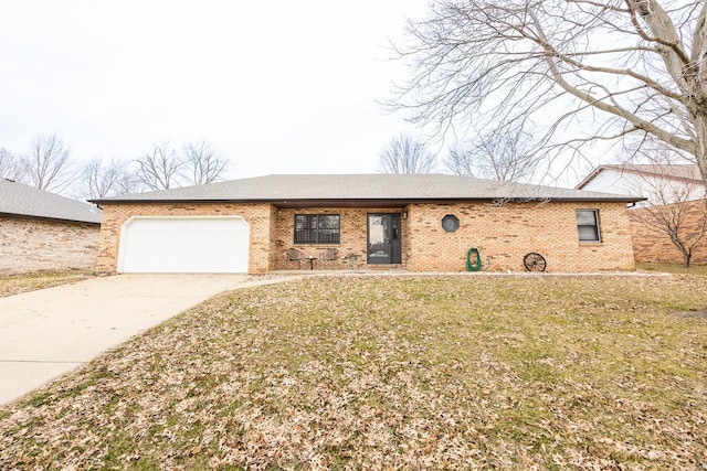 ranch-style home with brick siding, roof with shingles, concrete driveway, a garage, and a front lawn