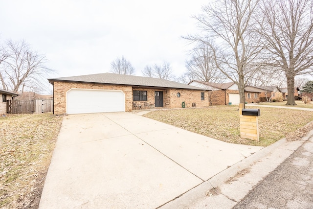 ranch-style home featuring brick siding, an attached garage, fence, driveway, and a front lawn