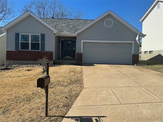 single story home featuring a garage, concrete driveway, brick siding, and roof with shingles