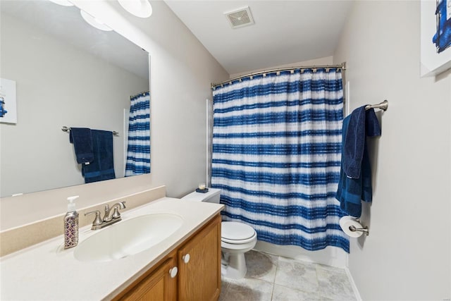 bathroom featuring visible vents, toilet, a shower with curtain, tile patterned flooring, and vanity