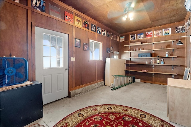 interior space featuring unfinished concrete floors