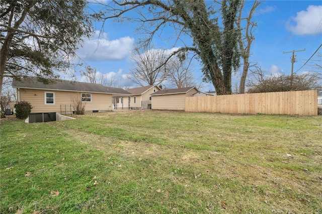 view of yard with fence