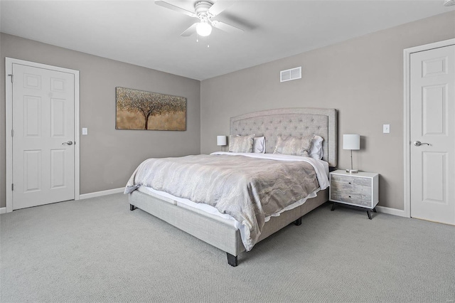 bedroom with a ceiling fan, carpet, visible vents, and baseboards