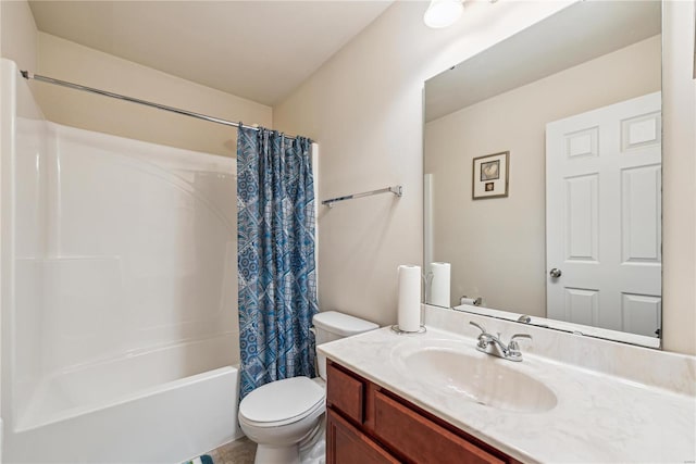 full bath featuring shower / bath combo with shower curtain, vanity, and toilet