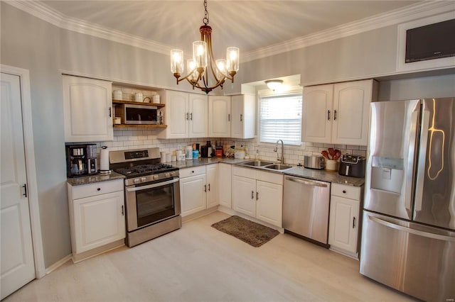 kitchen featuring stainless steel appliances, a sink, backsplash, and ornamental molding