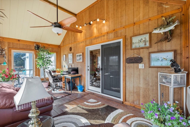 sunroom / solarium featuring vaulted ceiling and ceiling fan