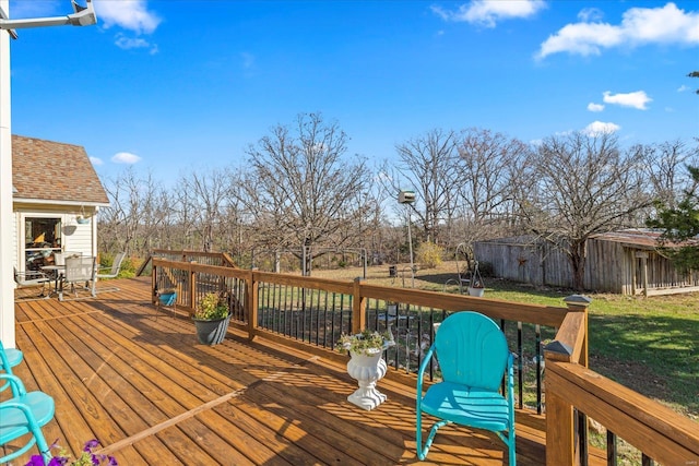 wooden deck with outdoor dining space