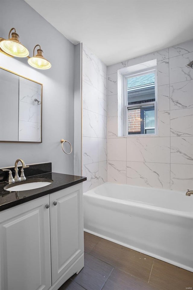 full bathroom featuring shower / bath combination and vanity