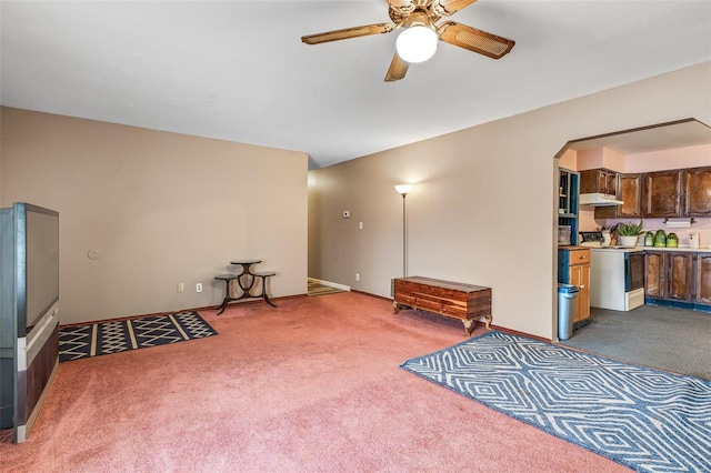 sitting room with carpet and ceiling fan