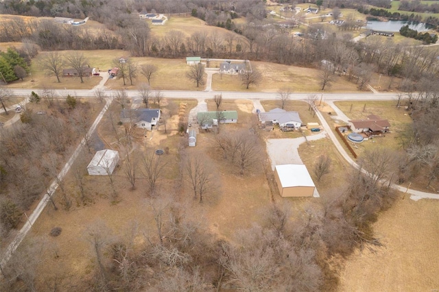 drone / aerial view with a rural view and a water view