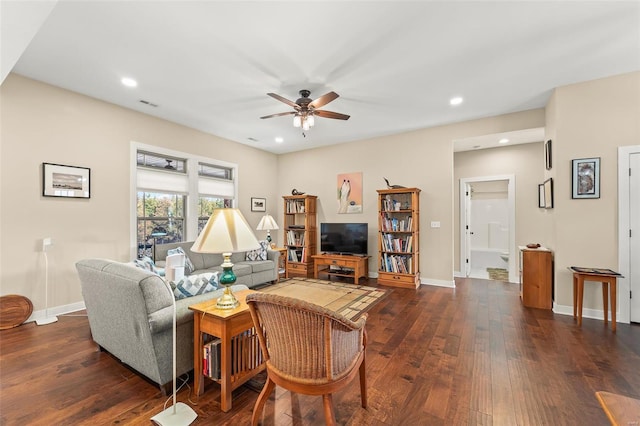 living area featuring visible vents, dark wood-type flooring, recessed lighting, baseboards, and ceiling fan