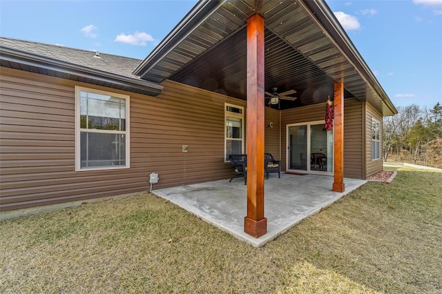 exterior space featuring a ceiling fan