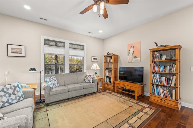 living room with a ceiling fan, wood finished floors, visible vents, baseboards, and recessed lighting