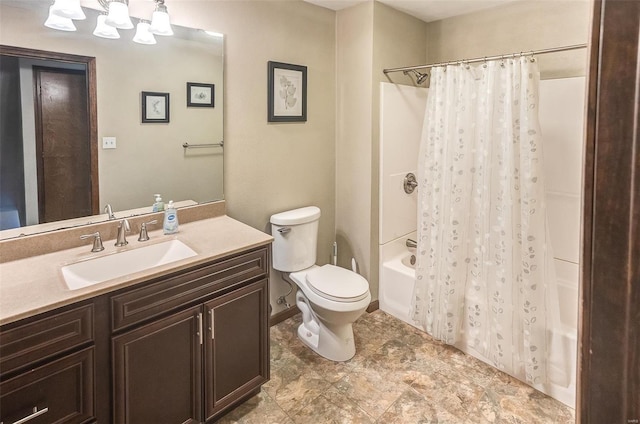 bathroom featuring shower / tub combo, vanity, and toilet