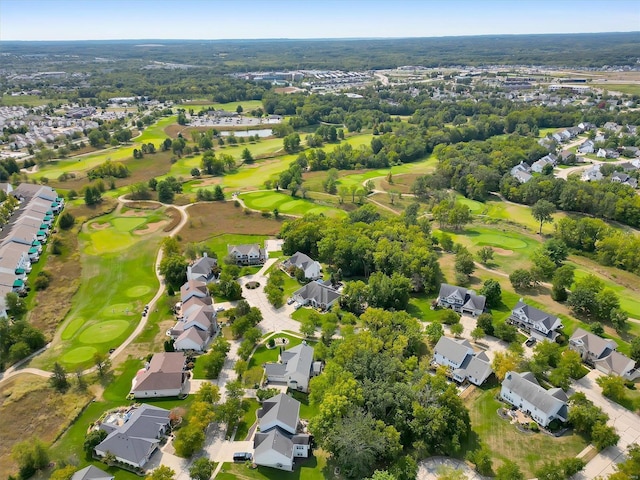 birds eye view of property featuring view of golf course and a residential view