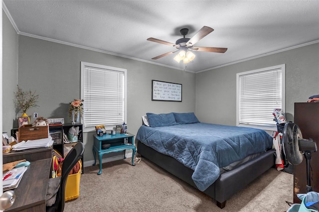 bedroom featuring a textured ceiling, ornamental molding, a ceiling fan, and light colored carpet