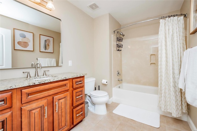 bathroom featuring toilet, shower / tub combo, visible vents, vanity, and tile patterned floors