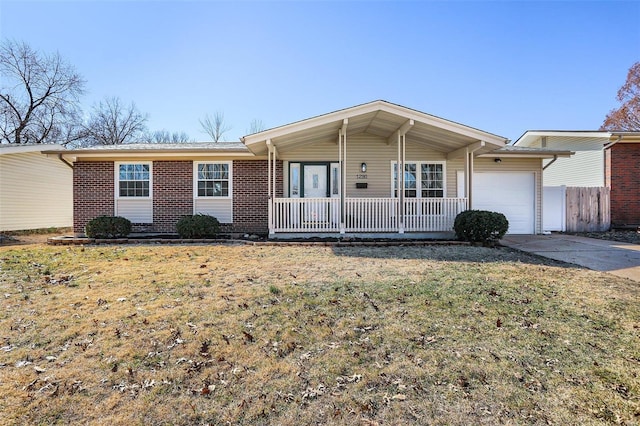 ranch-style home with a porch, brick siding, driveway, and an attached garage