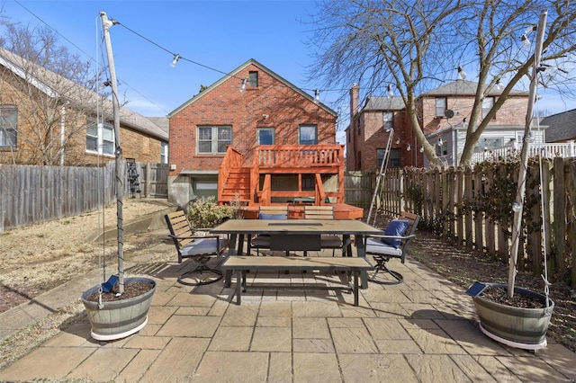 view of patio / terrace featuring outdoor dining area and a fenced backyard