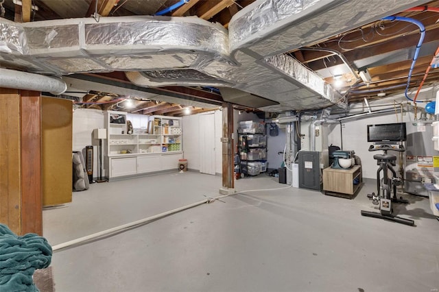 unfinished basement with water heater