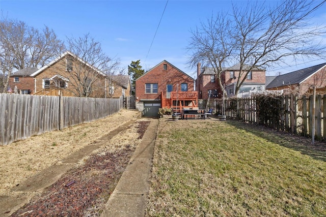 rear view of house featuring brick siding, a lawn, a fenced backyard, and dirt driveway