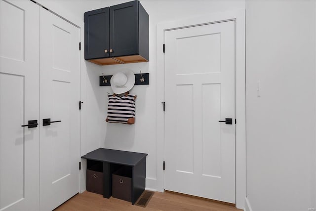 mudroom with light wood-type flooring