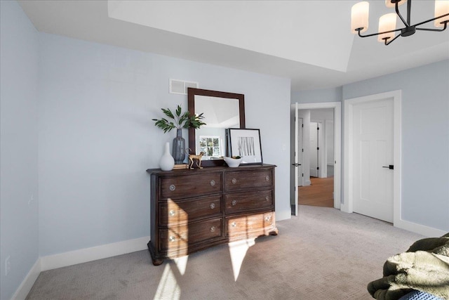 bedroom with a notable chandelier, carpet, visible vents, and baseboards