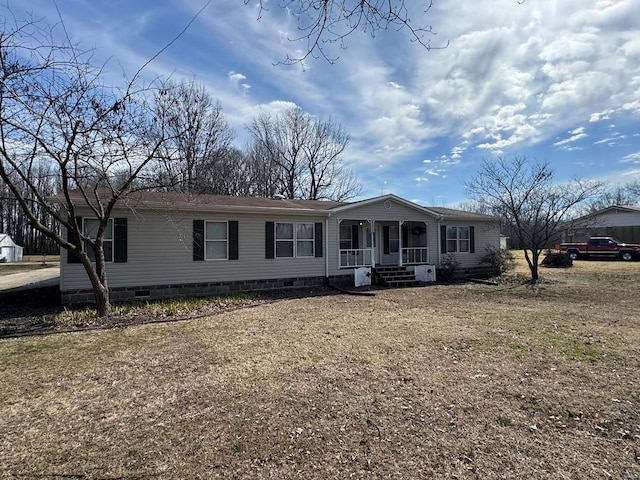 manufactured / mobile home with a porch and crawl space