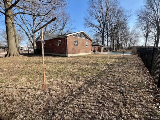 view of yard featuring fence