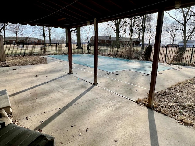 view of patio / terrace featuring fence and a fenced in pool