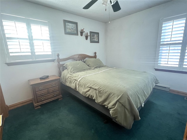 bedroom featuring a ceiling fan, dark colored carpet, and baseboards