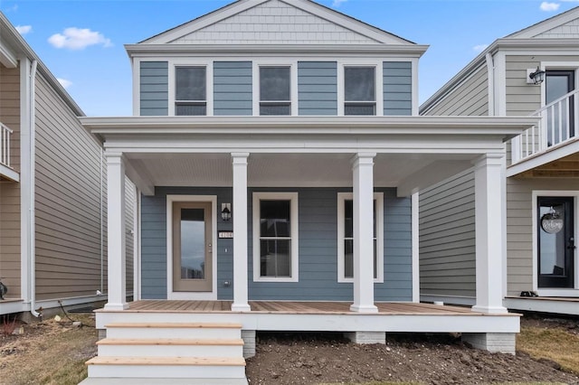 doorway to property with a porch