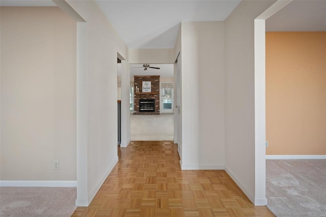 corridor featuring baseboards